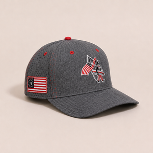 4th of July Hat 2026 — side view flat lay, embroidered American flag and LBC logo on front with red eyelets | Lost Boy Creations Key West