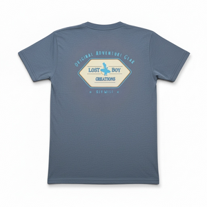 Men’s Original Adventure Gear Indigo Tee in Indigo — back view, vintage-style Original Adventure Gear logo print | Lost Boy Creations Key West