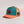 Coral Reefer high crown 6-panel trucker hat side view with Conch Republic flag patch orange brim and orange mesh back | Lost Boy Creations Key West