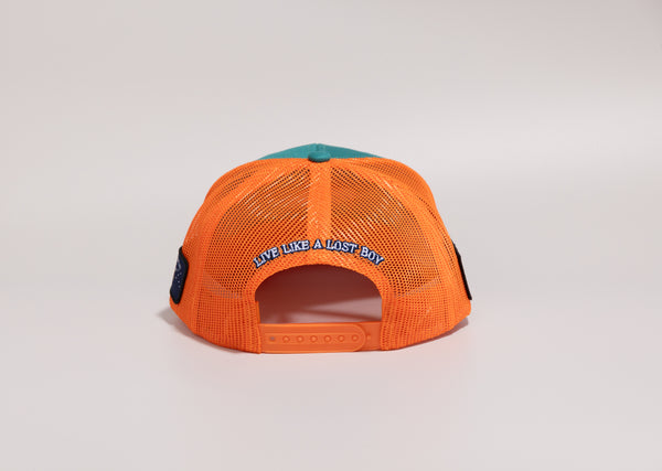 Coral Reefer high crown 6-panel trucker hat back view with white "Live Like a Lost Boy" embroidery on keyhole orange snapback closure and orange mesh back | Lost Boy Creations Key West