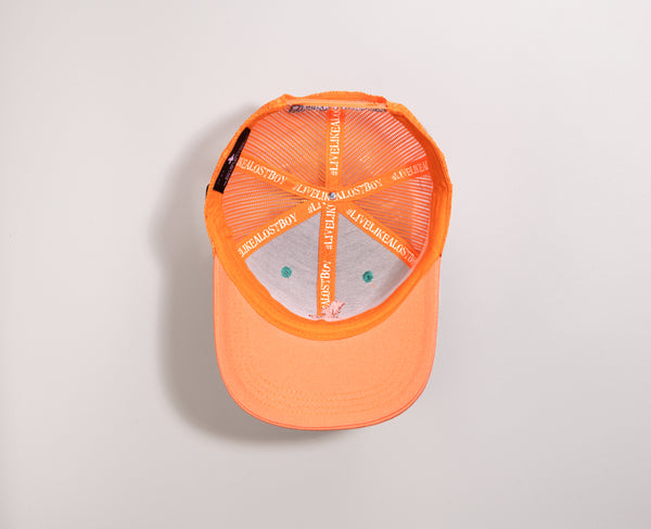 Coral Reefer high crown 6-panel trucker hat underside view showing orange underbrim and #LiveLikeALostBoy crown taping | Lost Boy Creations Key West