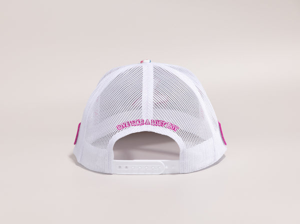 White cap with pink text 