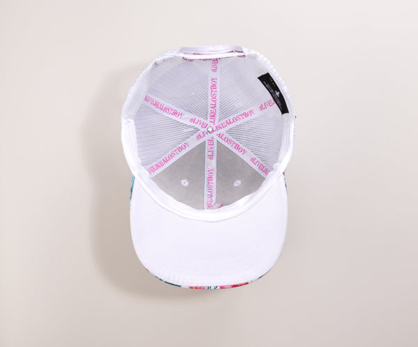 White cap with colorful pattern 