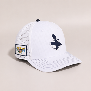 LBC Golf Hat in White — front view showing navy Lost Boy Creations rubber patch, USVI patch on right side | Lost Boy Creations Key West