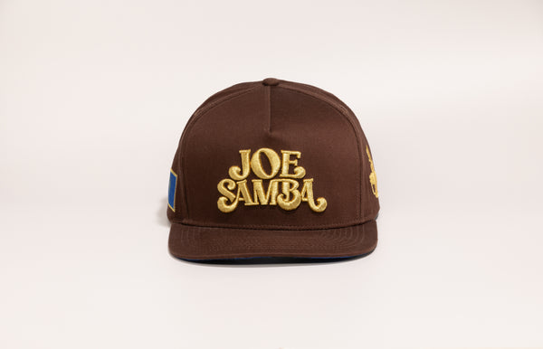 Joe Samba Collaboration hat front view with 3D gold embroidered Joe Samba logo | Lost Boy Creations Key West