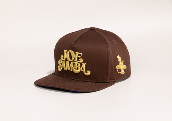 Joe Samba Collaboration hat side view with 3D gold embroidered Lost Boy Creations logo | Lost Boy Creations Key West