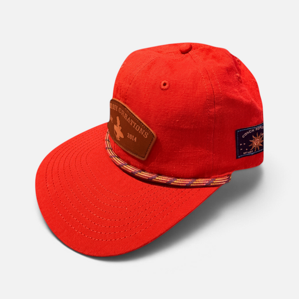 Tomato Soup Hat in Rustic Red — side view, brown leather patch, rope detail, and side embroidery | Lost Boy Creations Key West