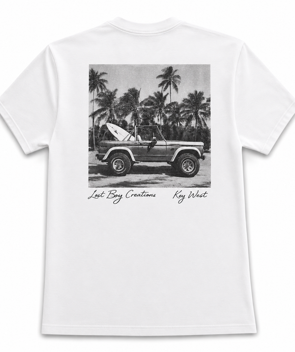 Men's Bronco Tee 2.0 in White — back flat lay, full-back Bronco graphic in tones of gray and black with signature Lost Boy Creations styling | Lost Boy Creations Key West