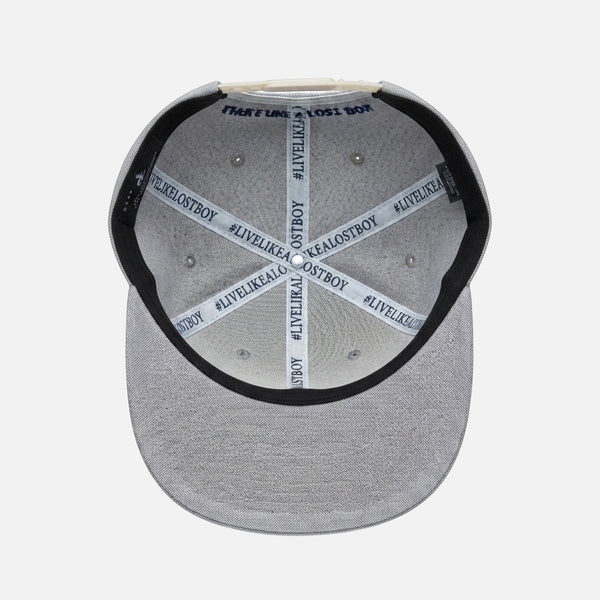 The Vanilla Ice Hat ivory structured trucker hat underside view showing gray underbrim and #LiveLikeALostBoy crown taping | Lost Boy Creations Key West