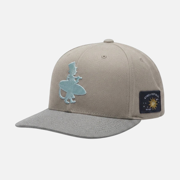 The Vanilla Ice Hat ivory structured trucker hat side view with icy blue Lost Boy logo and Conch Republic Key West patch on right side | Lost Boy Creations Key West