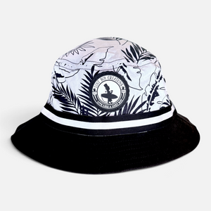 Under Cover Bucket Hat in Black/White — product view, black-and-white tropical leaf print with solid black brim | Lost Boy Creations Key West