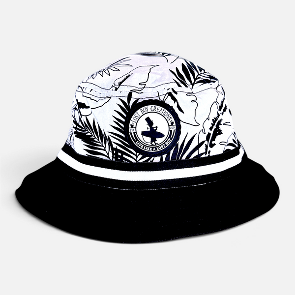Under Cover Bucket Hat in Black/White — product view, black-and-white tropical leaf print with solid black brim | Lost Boy Creations Key West