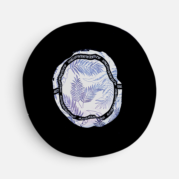 Under Cover Bucket Hat in Black/White — interior detail, tropical leaf print lining with black brim | Lost Boy Creations Key West