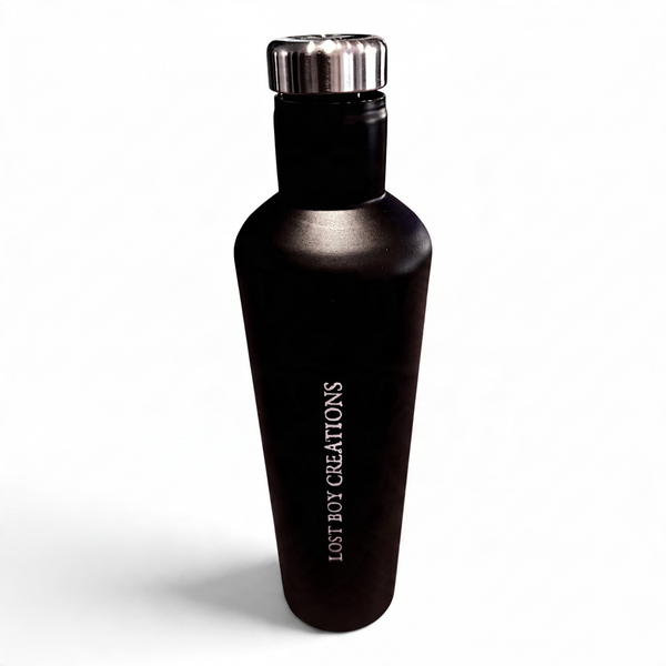 LBC Captain's Bottle in Black/White — elevated back view, vertical white Lost Boy Creations lettering and silver cap | Lost Boy Creations Key West