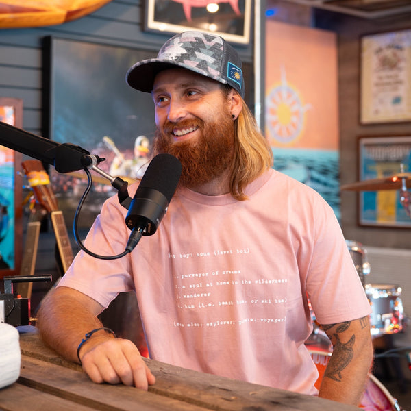 Fuzzy Wuzzy in Soft Geometric Pattern — lifestyle shot, worn by a man during casual indoor interview | Lost Boy Creations Key West