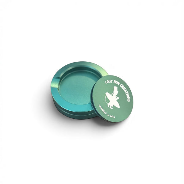 Utility Pocket Tin in Dark Green — open view showing interior storage and LBC logo on lid | Lost Boy Creations Key West
