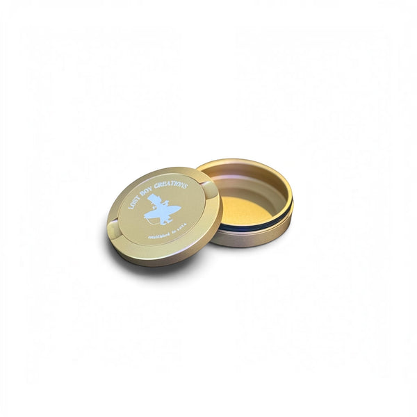 Utility Pocket Tin in Gold — open view showing interior storage and LBC logo on lid | Lost Boy Creations Key West