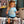 Girl wearing Kid's Day Trippin Tee in Sky Blue playing drums in the Lost Boy Creations shop | Lost Boy Creations Key West