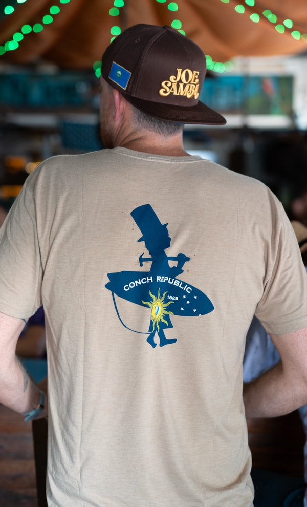 Men's Conch Republic Tee — lifestyle, man wearing Hazelnut tee and Joe Samba hat | Lost Boy Creations Key West