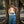 Women's Bronco Racerback Tank in White — on-model back graphic outdoor lifestyle, black Bronco and palm tree scene graphic | Lost Boy Creations Key West