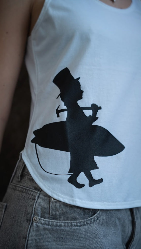Women's Silhouette Tank in White — on-model graphic close-up, black Lost Boy silhouette with top hat, surfboard, and anchor | Lost Boy Creations Key West
