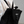 Mini Bag in Black — on-model lifestyle worn on back, white Lost Boy Creations silhouette logo | Lost Boy Creations Key West