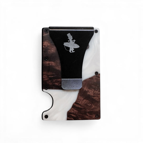 Lost Boy Creations wood and epoxy cash clip card holder White colorway front view showing engraved Lost Boy silhouette logo | Lost Boy Creations Key West