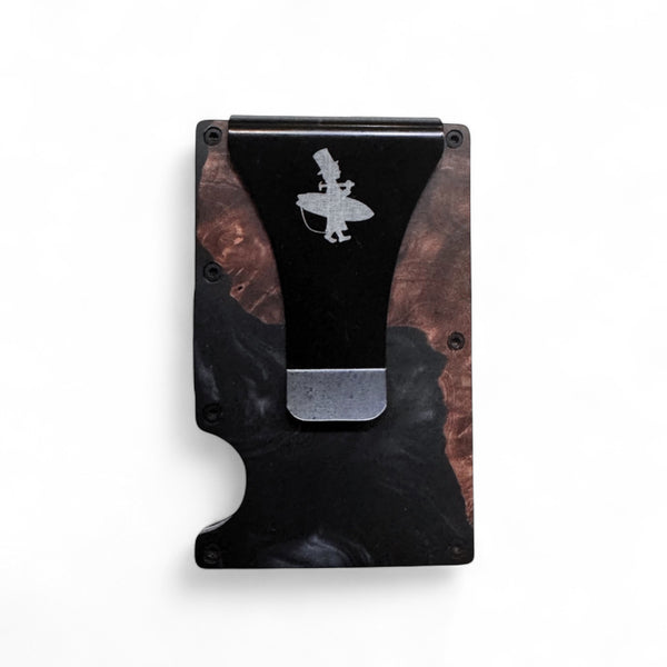 Lost Boy Creations wood and epoxy cash clip card holder Black colorway front view showing engraved Lost Boy silhouette logo | Lost Boy Creations Key West
