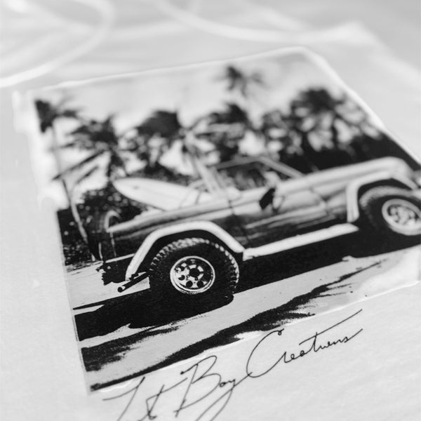 Women's Bronco Racerback Tank in White — angled closeup of black and white Bronco graphic | Lost Boy Creations Key West