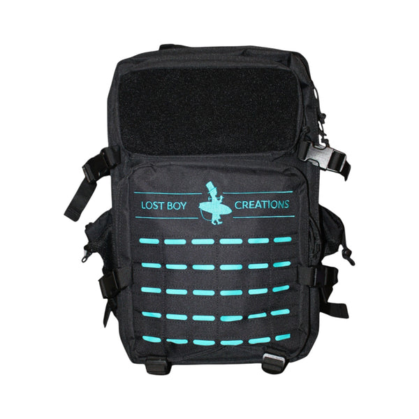 Lost Boy Creations 45L adventure backpack Black Teal colorway front view with velcro patch panel | Lost Boy Creations Key West
