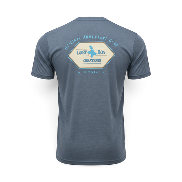Back view of a Lost Boy Creations indigo blue short-sleeve t-shirt with a vintage-style adventure logo graphic.