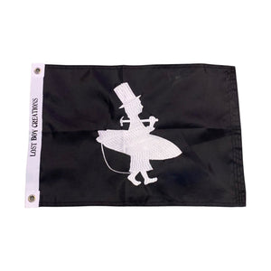 Lost Boy Creations Hoist the Colors black flag embroidered with a white logo on  both sides shown horizontal with large Lost Boy logo in center and Lost Boy Creations text on side webbing | Lost Boy Creations Key West