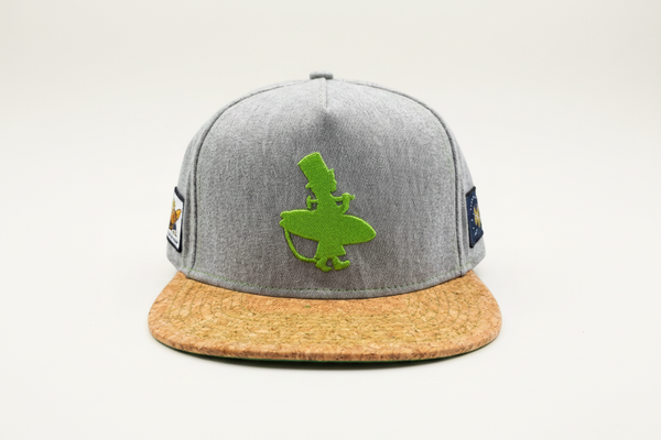 Lime and Cork flat bill snapback hat grey heather crown front view with green raised Lost Boy surfer embroidery and natural cork brim | Lost Boy Creations Key West