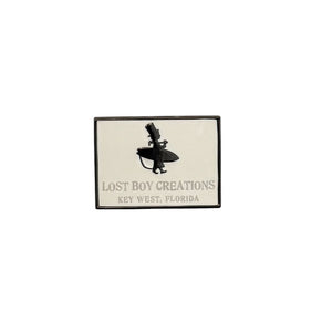 Lost Boy Creations logo collectible pin — rectangular hard enamel pin, black LBC logo on white background | Lost Boy Creations Key West