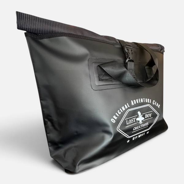 On Deck Dry Bag in Black — logo detail, white Lost Boy Creations print | Lost Boy Creations Key West
