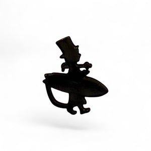 Lost Boy Logo Collectible Pin all-black enamel silhouette of Lost Boy surfer with top hat and surfboard | Lost Boy Creations Key West