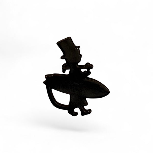 Lost Boy Logo Collectible Pin all-black enamel silhouette of Lost Boy surfer with top hat and surfboard | Lost Boy Creations Key West