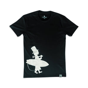 Lost Boy Creations black crew neck t-shirt with a white off-center silhouette graphic of a boy carrying a surfboard.