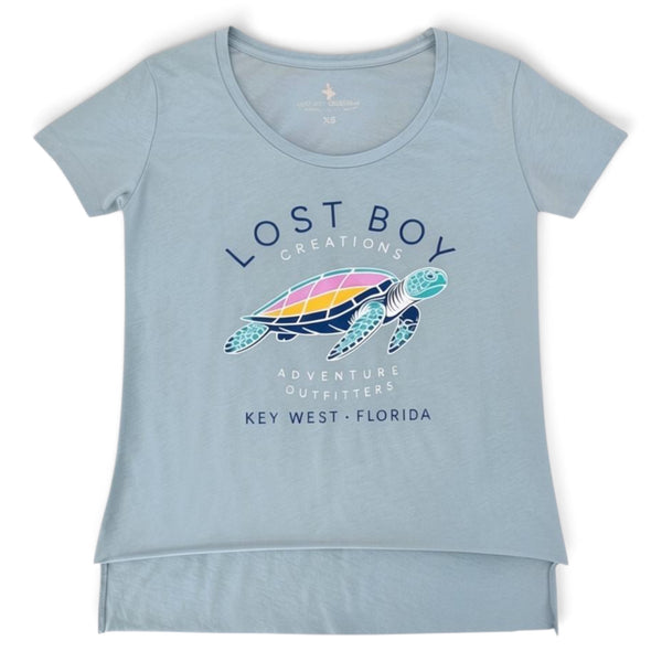 Women's Half Crop Turtle Tee in Light Blue — front view, colorful sea turtle graphic with Key West text | Lost Boy Creations Key West