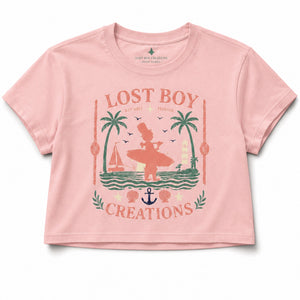 Women's Cropped Beach Day Tee dusty blush front view with vintage Key West surfer scene graphic | Lost Boy Creations Key West
