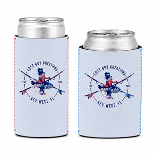 Lost Boy Koozie - Floral in Dusty Blue — hero shot, slim can and standard can with cans inserted, navy coral and pink floral surfer logo | Lost Boy Creations Key West