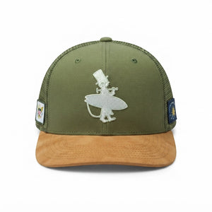 Dr. Green Thumb 2.0 Trucker Hat — front view, white embroidered Lost Boy surfer logo on dark green low crown with tan suede brim | Lost Boy Creations Key West