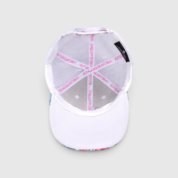 Interior view of Lost Boy Creations Hokulea snapback hat showing white mesh, pink branded tape, and floral brim