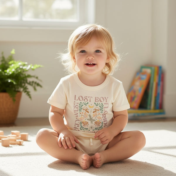 Kid's Day Trippin Tee ivory lifestyle shot worn by toddler in bright room | Lost Boy Creations Key West