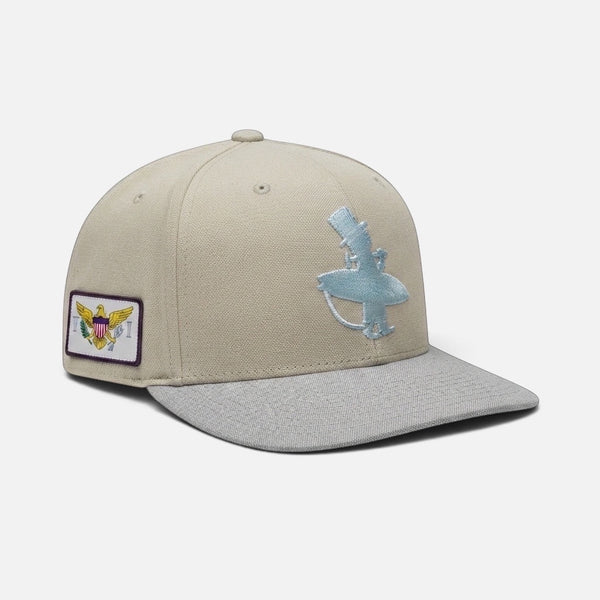 Vanilla Ice Hat in Ivory — side flat lay, metallic blue LBC logo with USVI flag patch | Lost Boy Creations Key West