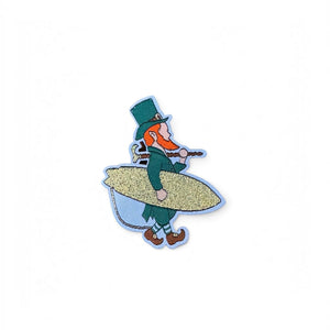Lost Boy Creations limited edition embroidered St. Patrick's Day patch featuring a leprechaun carrying a surfboard