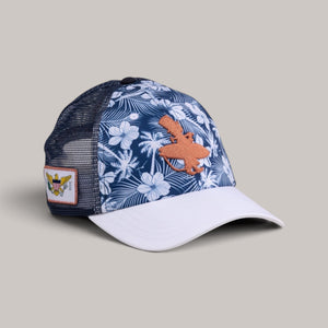 Lost Boy Creations Lei'd Back navy floral snapback hat with white brim, orange logo, and side flag patch.