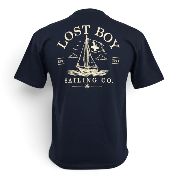 Lost Boy Creations midnight navy cotton t-shirt featuring a white sailing boat graphic on the back