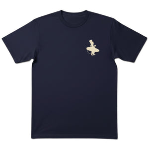 Lost Boy Creations midnight navy cotton t-shirt with a small cream-colored surfer graphic on the left chest.