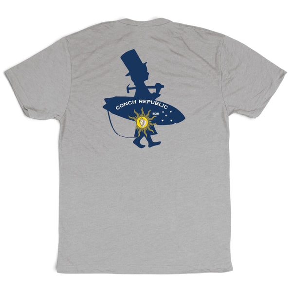 Men's Conch Republic Tee in Quartz Grey — back flat lay, navy Conch Republic logo graphic | Lost Boy Creations Key West